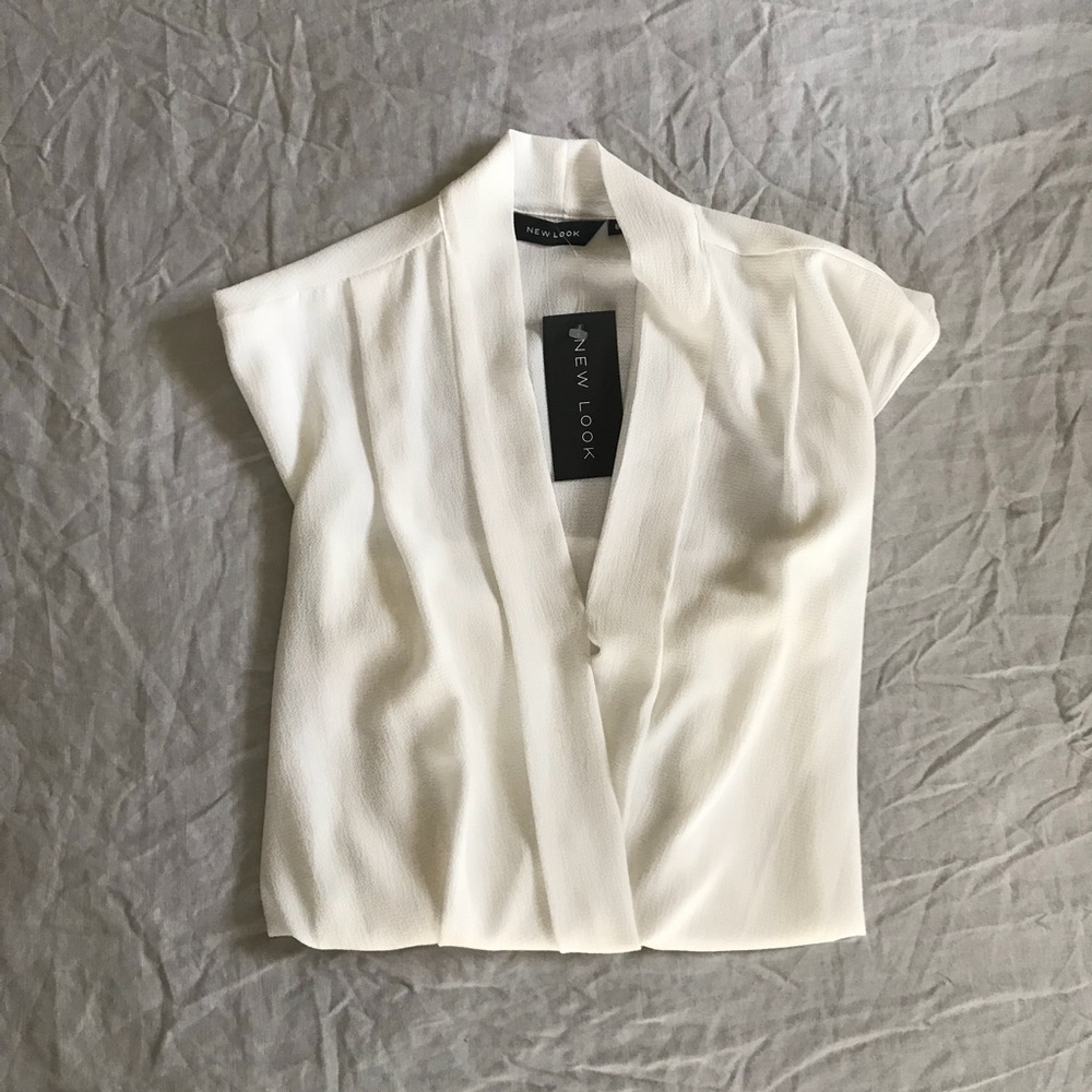 White Sleeveless Blouse